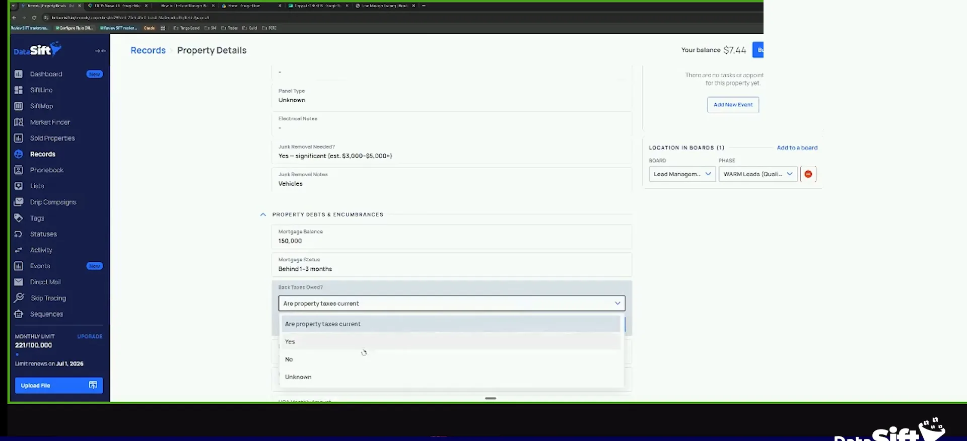 Property details screen showing mortgage information and an open property tax status dropdown
